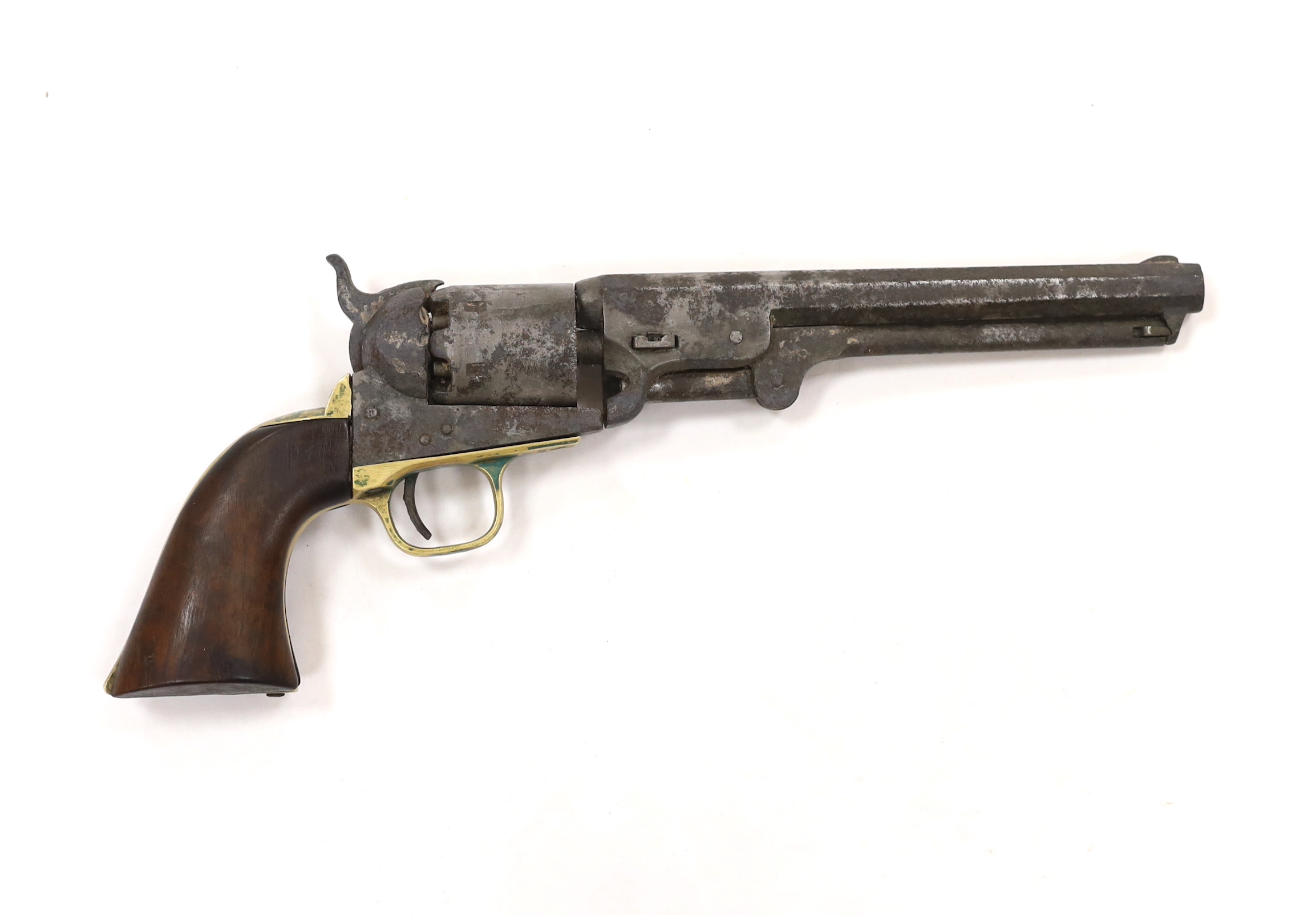 A six shot .36” Colt Navy percussion revolver number 200761 (matching) regulation underlever rammer, brass grip strap and trigger guard, pitted and worn overall